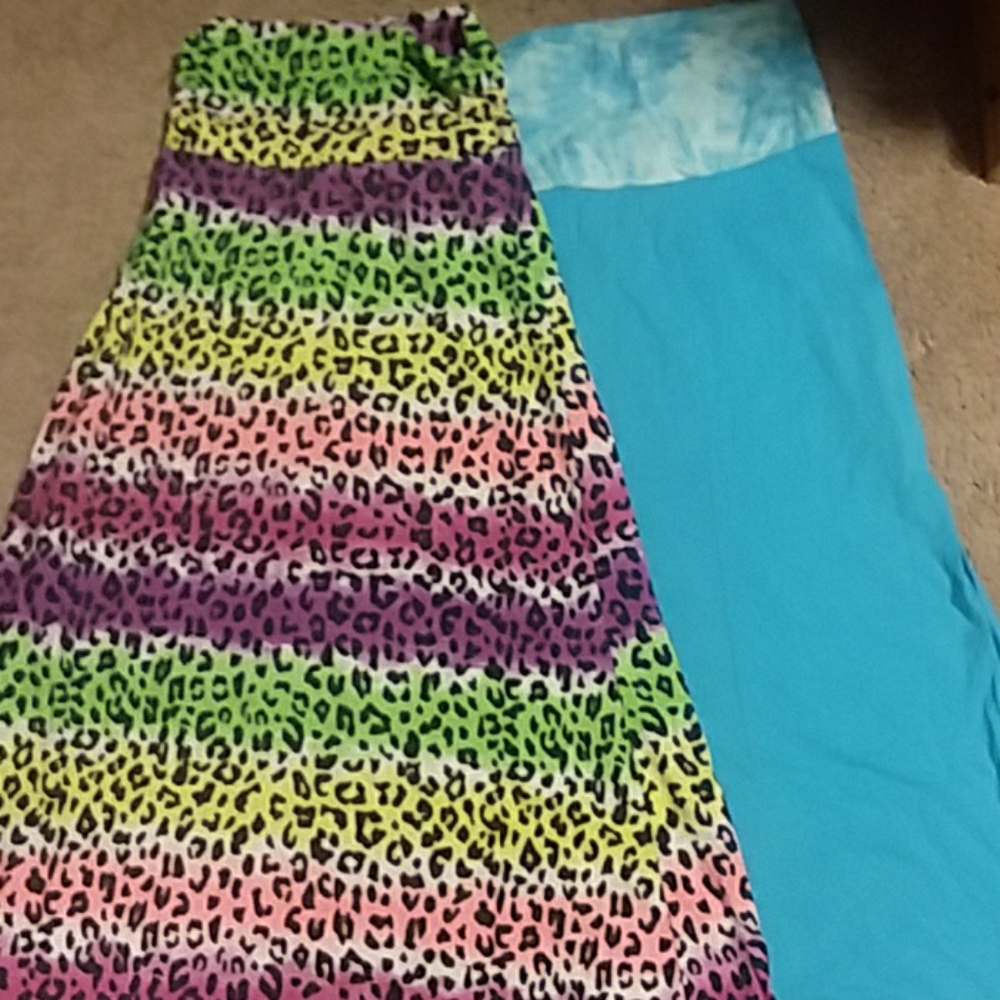 These are 2 long kids skirts